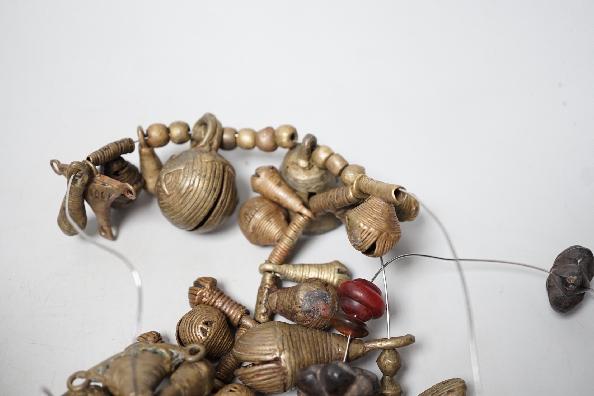 A group of tribal African jewellery, Baule and Bamelette